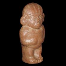 Hominoid terracotta figure